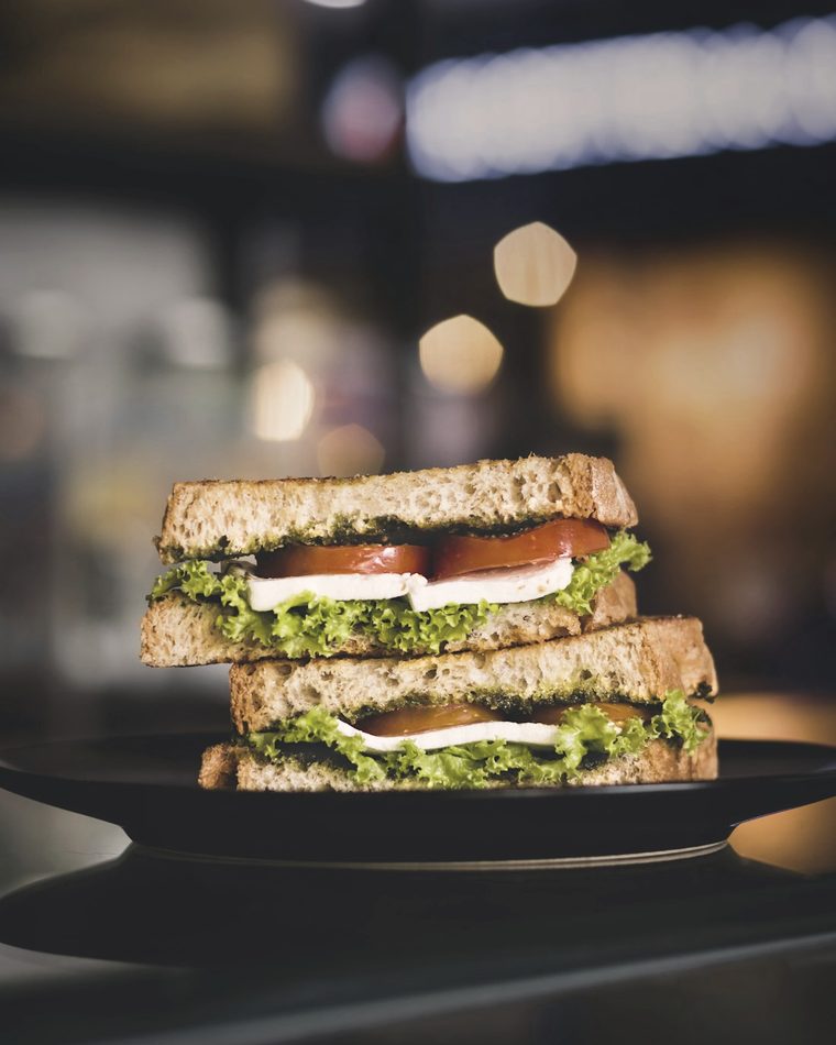 A stacked sandwich on artisanal bread